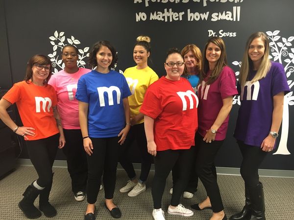 Staff all in M&Ms costumes